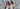 Briana and Brittany Murillo pose together, with Briana gracefully spritzing the Mirrored Image Eau de Parfum into the air from Murillo Twins Fragrance.